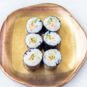 A plate of Mackerel sushi.