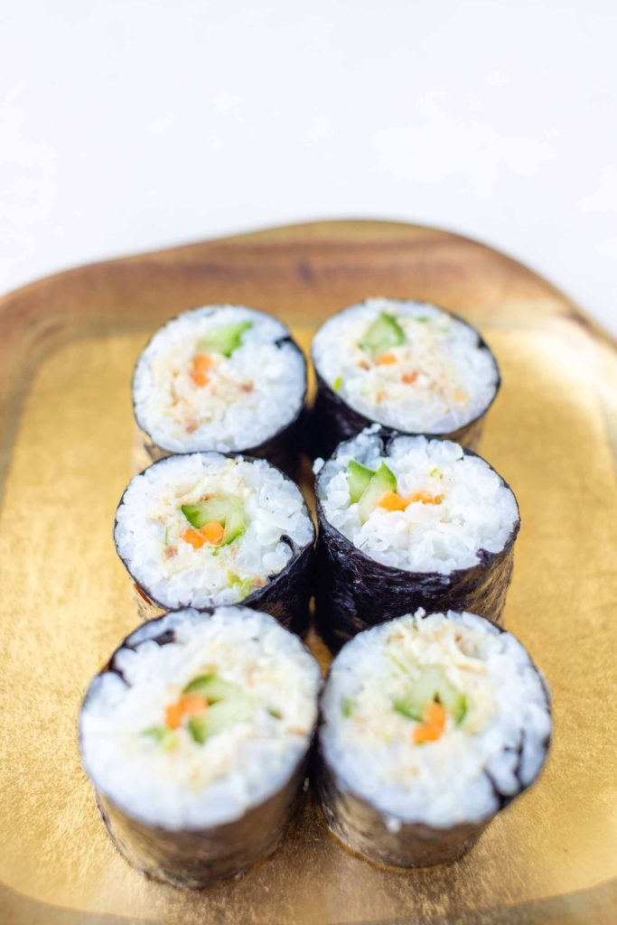 a plate of mackerel sushi