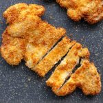 A piece of sliced air fryer chicken katsu