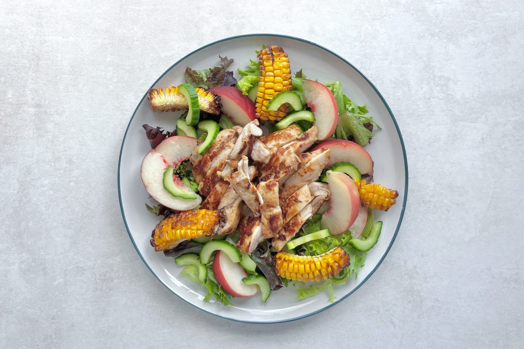 A plate of Miso and Peach Chicken Salad